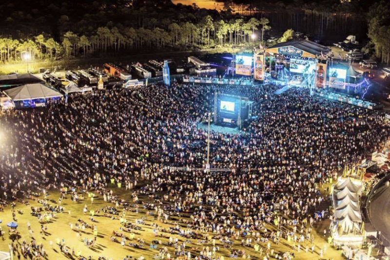 Crowd and traffic near a Panama City Beach music festival venue